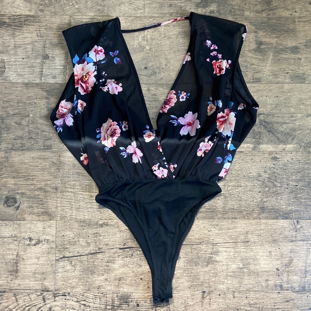 Open back body suit.